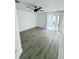 Bright and spacious bedroom with ample natural light, light floors and large sliding glass doors at 2615 Autumn Green Dr, Orlando, FL 32822
