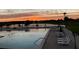 Community swimming pool with lounge chairs overlooking the water, perfect for relaxation at 2615 Autumn Green Dr, Orlando, FL 32822