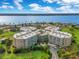 A high angle view of a condo community with a river view in the background at 4 Oceans West Blvd # 301B, Daytona Beach Shores, FL 32118
