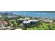 Beautiful aerial view of a condo complex on a golf course with stunning water and neighborhood views at 4 Oceans West Blvd # 301B, Daytona Beach Shores, FL 32118