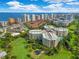 Aerial view of waterfront condo community on the ocean with city views at 4 Oceans West Blvd # 301B, Daytona Beach Shores, FL 32118