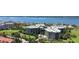 Elevated perspective of a condo community on a golf course with nearby access to beaches and waterways at 4 Oceans West Blvd # 301B, Daytona Beach Shores, FL 32118