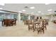 The community dining room has tables and chairs to seat a large group at 4 Oceans West Blvd # 301B, Daytona Beach Shores, FL 32118
