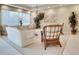 The community lobby is filled with places to sit and relax with plants at 4 Oceans West Blvd # 301B, Daytona Beach Shores, FL 32118