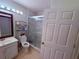 Functional bathroom with a glass-door shower, sink, and vanity for everyday convenience at 4328 S Kirkman Rd # 1, Orlando, FL 32811