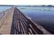 Beautiful view from a wooden dock over a serene lake at 4328 S Kirkman Rd # 1, Orlando, FL 32811