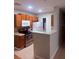Traditional kitchen with stainless steel appliances and light wood cabinets for a cozy space at 4328 S Kirkman Rd # 1, Orlando, FL 32811