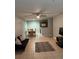 Open-concept living and dining area with tile floors and a ceiling fan at 4328 S Kirkman Rd # 1, Orlando, FL 32811