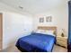 Comfortable bedroom with a queen size bed and bright walls at 452 Burnham Cir, Auburndale, FL 33823