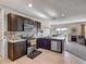 Stylish kitchen features stainless steel appliances and an open concept design at 452 Burnham Cir, Auburndale, FL 33823
