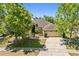 Charming single-story home with a well-manicured lawn and mature trees in a desirable neighborhood at 5365 Dahlia Reserve Dr, Kissimmee, FL 34758
