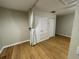 Cozy room featuring hardwood flooring, neutral walls, and a closet at 541 Campus St, Celebration, FL 34747