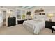 Bright bedroom offers neutral decor, natural light, and decorative accents at 541 Campus St, Celebration, FL 34747