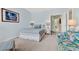 Stylish bedroom with bright color scheme, large bed, and decorative accents at 541 Campus St, Celebration, FL 34747