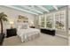 Bright, naturally lit bedroom features ceiling fan, accent wall, and calming decor at 541 Campus St, Celebration, FL 34747