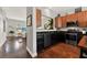 Updated kitchen features stainless steel appliances, granite countertops, and wood floors at 541 Campus St, Celebration, FL 34747