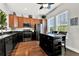Modern kitchen features stainless steel appliances, central island, and bright natural light at 541 Campus St, Celebration, FL 34747