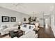 Spacious open-concept layout with living and dining areas, complemented by rich hardwood floors at 541 Campus St, Celebration, FL 34747