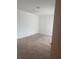Comfortable bedroom featuring neutral carpeting and a bright atmosphere at 567 Caribbean Dr, Davenport, FL 33897