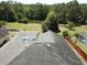 Aerial view of a home featuring a screened in pool and stunning backyard at 624 Montana Ave, Davenport, FL 33897