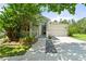 Inviting home exterior with a cozy front porch and neatly landscaped yard at 6886 Sundrop St, Harmony, FL 34773