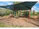 Shaded playground with slides, climbing structures, and soft ground cover for safe play at 6886 Sundrop St, Harmony, FL 34773