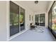 Relax on this beautiful screened porch with view to side yard at 6886 Sundrop St, Harmony, FL 34773