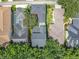 Neighborhood aerial view highlighting the home's location with mature trees and landscaping at 715 Honeysuckle Ave, Celebration, FL 34747