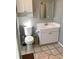 Clean bathroom featuring a vanity, toilet and small linen closet at 715 Honeysuckle Ave, Celebration, FL 34747