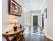 Elegant foyer featuring a striking tile pattern, ample natural light, and a welcoming ambiance at 715 Honeysuckle Ave, Celebration, FL 34747