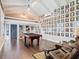 Spacious game room with high ceilings, a pool table, and a charming loft area for  at 715 Honeysuckle Ave, Celebration, FL 34747
