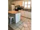 Kitchen with an island and a white cabinets and appliances at 715 Honeysuckle Ave, Celebration, FL 34747