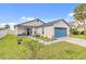 Attractive single-Gathering home with well-kept lawn and a inviting front porch at 7830 Myrtle Oak Ln, Kissimmee, FL 34747