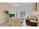 Cozy living room with backyard views, comfortable seating, and a calming atmosphere at 7830 Myrtle Oak Ln, Kissimmee, FL 34747