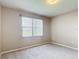 Bright, inviting bedroom bathed in natural light from a large window at 817 Grand Canal Dr, Kissimmee, FL 34759