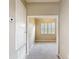 Neutral carpeted bedroom features a closet and window at 817 Grand Canal Dr, Kissimmee, FL 34759