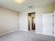 Spacious bedroom with an adjoining ensuite bathroom and walk-in closet at 817 Grand Canal Dr, Kissimmee, FL 34759