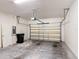 Spacious two-car garage with garage door system at 817 Grand Canal Dr, Kissimmee, FL 34759