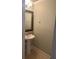 Cozy bathroom featuring a pedestal sink and neutral colored walls at 8369 Riverdale Ln # 1, Davenport, FL 33896