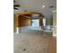 Spacious living area with decorative ceiling detail and entrance to the formal dining room at 8369 Riverdale Ln # 1, Davenport, FL 33896