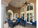 Patio with comfortable wicker seating and ceiling fans offering a relaxing outdoor space at 8369 Riverdale Ln # 1, Davenport, FL 33896