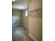 Spacious walk-in closet featuring wire shelving and carpeted floor at 8369 Riverdale Ln # 1, Davenport, FL 33896