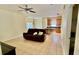 Open-concept living room with kitchen and eat-in dining area at 954 Hacienda Cir, Kissimmee, FL 34741