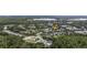 A beautiful community featuring mature trees, a community pool, and many single-Gathering homes near a gorgeous lake at 14314 Pleach St, Winter Garden, FL 34787