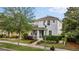 Charming two-story home with a well-manicured lawn and inviting curb appeal at 14314 Pleach St, Winter Garden, FL 34787
