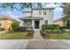 Beautiful two-story home featuring manicured landscaping and a welcoming front porch at 14314 Pleach St, Winter Garden, FL 34787