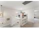 The landing has a staircase, office space, and carpeted floors that lead to a bedroom at 14314 Pleach St, Winter Garden, FL 34787