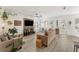 Spacious living room with a modern TV wall and tile flooring at 14314 Pleach St, Winter Garden, FL 34787