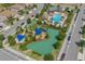 Aerial view of community amenities like a pool, playground and recreation areas at 1000 Blackwolf Run Rd, Davenport, FL 33896