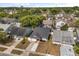Aerial view of neighborhood featuring trees and other houses at 1208 Roma Ct, Orlando, FL 32825
